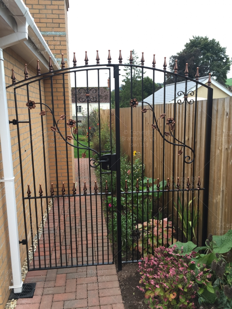 iron side gate beside house